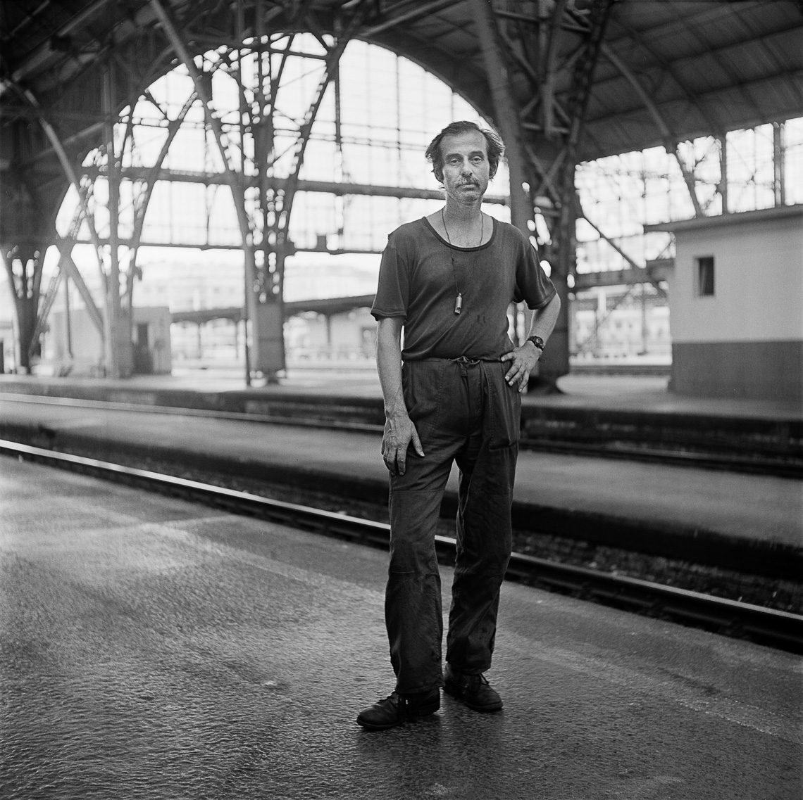 black-white-portrait-man-train-station
